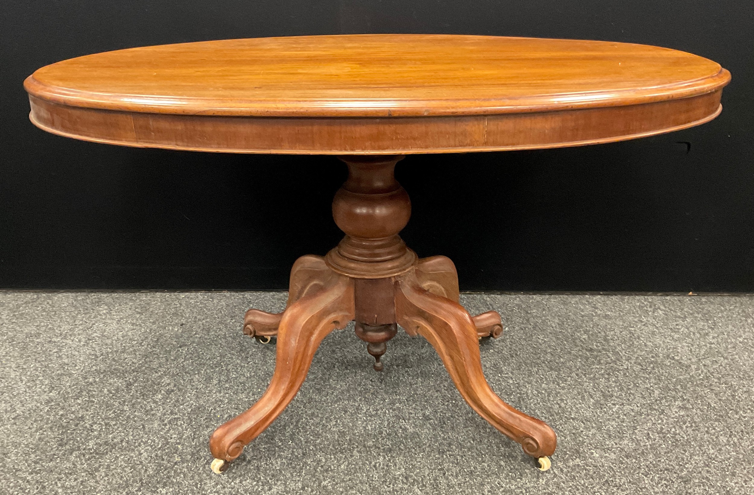 A Late Victorian mahogany Loo Table, oval top tilt-top, turned pedestal base with four carved, - Image 2 of 2