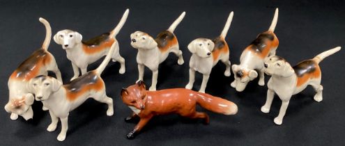 Beswick - seven Beswick hunt man’s hounds and conforming fox (8)
