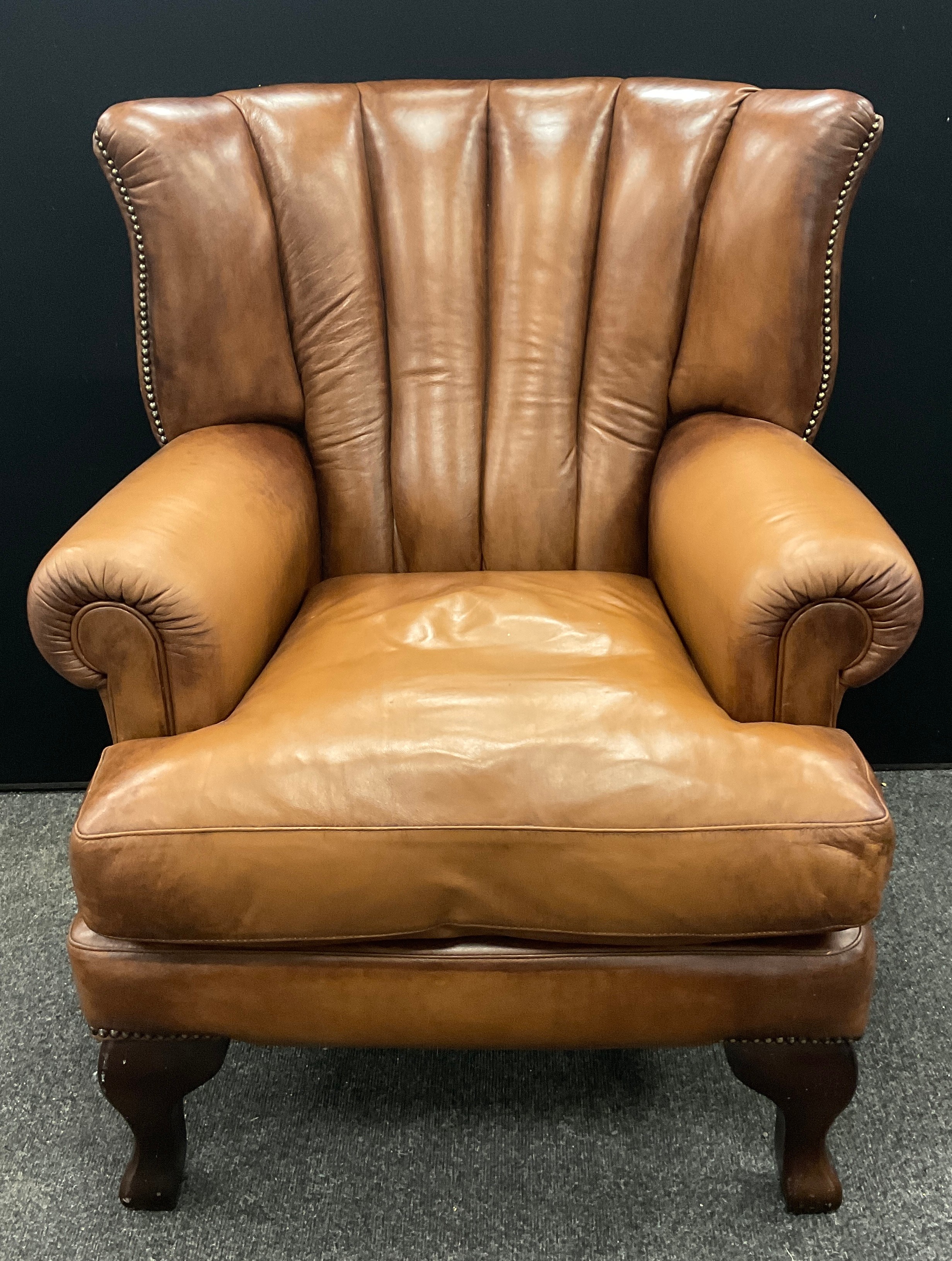 A tan leather ‘Tetrad Blake’ type, ‘Barrel-back’ armchair, 101cm high x 83cm wide x 91cm deep. - Image 2 of 2