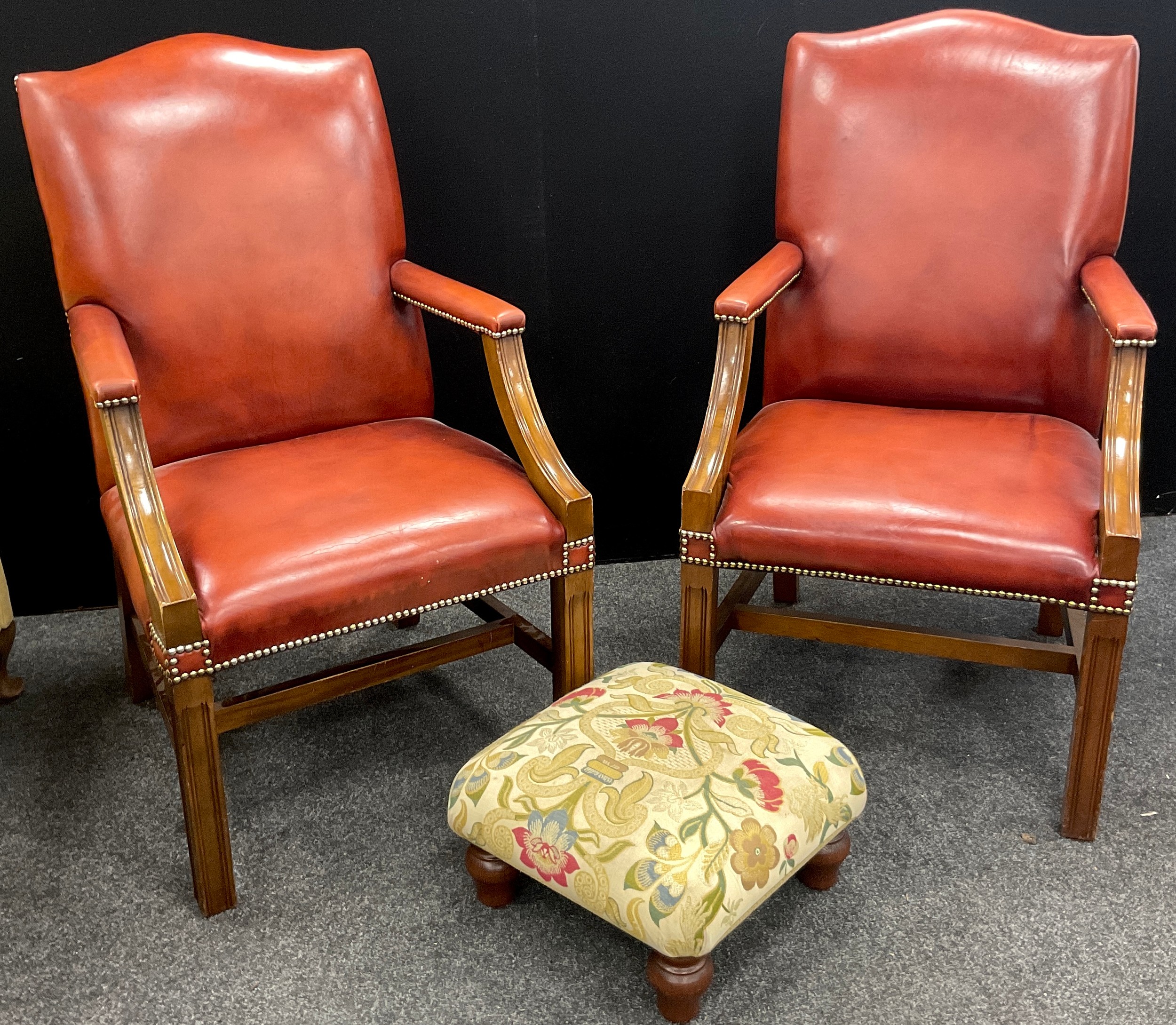 A pair of tan leather Gainsborough office chairs, 105cm high x 60cm wide; a footstool, (3). - Image 2 of 2