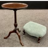 A 19th century footstool, serpentine-shaped top, cabriole legs with carved scroll terminals, 15cm