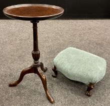 A 19th century footstool, serpentine-shaped top, cabriole legs with carved scroll terminals, 15cm
