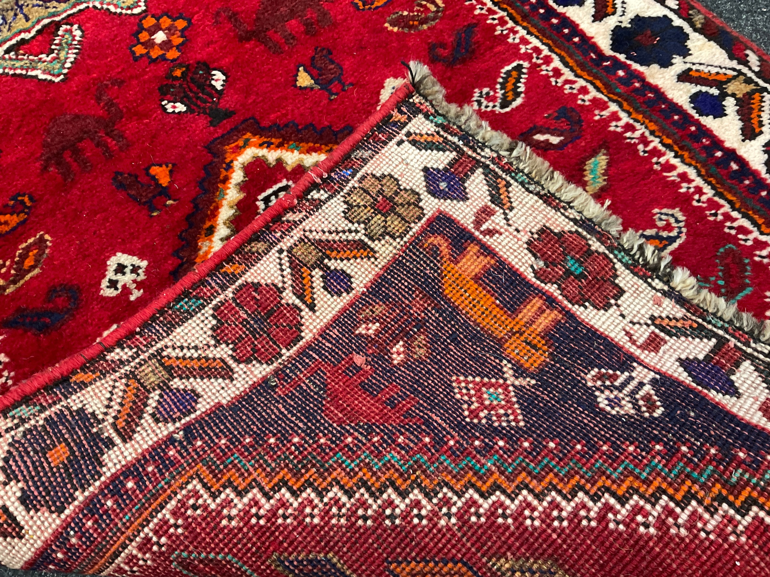 A South-west Persian Qashgai runner carpet, hand-knotted in rich colours, with five medallions, - Image 3 of 3