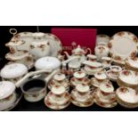 A extensive Royal Albert ‘Old Countryroses’ table service for six comprised of; six dinner plates,