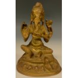 An Indian gilt bronze, Ganesh