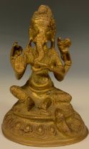 An Indian gilt bronze, Ganesh