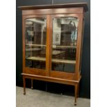 An early 20th century mahogany china display cabinet, 175cm high x 112cm (124cm at cornice) wide x