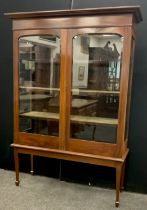 An early 20th century mahogany china display cabinet, 175cm high x 112cm (124cm at cornice) wide x