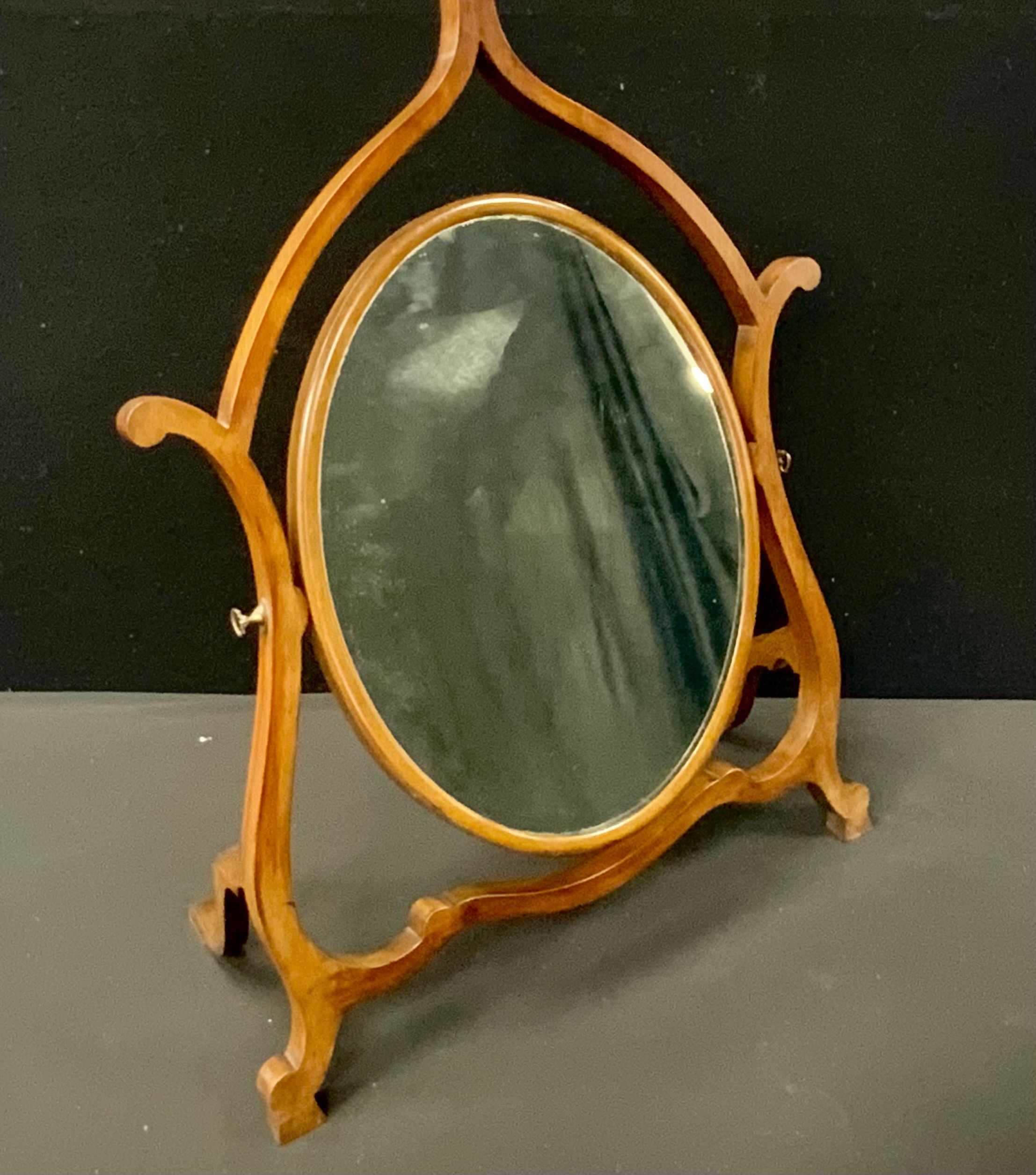 A George III revival mahogany dressing glass, early 20th century