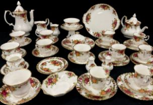 A Royal Albert Old Country Rose pattern tea and coffee set including teapot, coffee pot, six tea