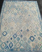 An Anotolian style Kilim rug, geometric stripped bands, approx 350cm x 255cm