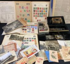 A quantity of Stamps and Coins, postcards and newspapers; etc