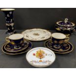 A German Democratic Republic Echt Kabalt tureen and cover, waisted cylinder vase; pair of trios, etc