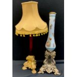 A late Victorian hand painted milk glass lamp stand, silver metal baroque style stand, 62cm high;