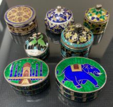 An enamelled white metal pill box, Taj Mahal; others Elephant, floral etc, all unmarked white metal,