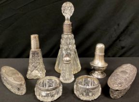 An Edwardian silver topped oval cut glass dressing table trinket box, Birmingham 1905; another