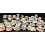 A quantity of floral and patterned tea cups and saucers including; The Leonardo Collection,