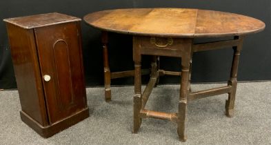 A George III oak drop-leaf table, single drawer to frieze, 68cm high x 115cm x 86.5cm; a Victorian