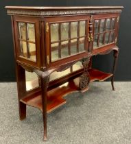 An Edwardian Vitrine cabinet, carved frieze, glazed doors and sides with domed glass panels,