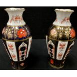A pair of Royal Crown Derby 1128 Imari fluted ovoid baluster vases, printed marks, 1.5cm high (2)