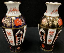 A pair of Royal Crown Derby 1128 Imari fluted ovoid baluster vases, printed marks, 1.5cm high (2)