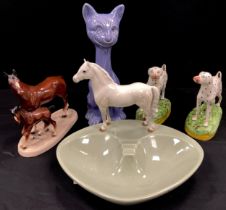 A pair of Staffordshire pottery models, Dalmatian's standing, mossy bases; Beswick 1918 shaped bowl,