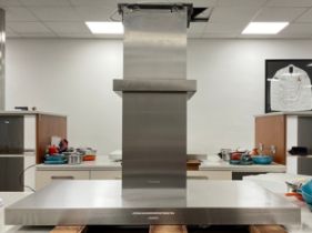 A Miele 48" (120cm) variable height island extractor hood, model number DA 424 V.