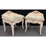 A pair of Louis XV style cream and gilt rose back bedside tables, frieze drawer, cabriole support,