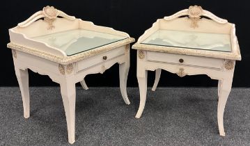 A pair of Louis XV style cream and gilt rose back bedside tables, frieze drawer, cabriole support,