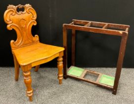 A Victorian oak hall chair, c.1860; a three-section umbrella or walking stick stand (2) ***Please