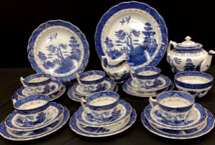 A Booths Real Old Willow pattern six setting tea set inc teapot, large plate, cups saucers, side