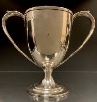 A George III silver twin handled trophy, plain body, floral cast and X banded tapering handles, 15.