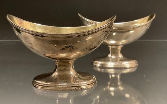 A matched pair of George III silver oval table salts, gilt interiors, triple banded rim and foot,