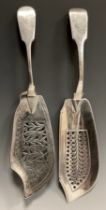 A George III silver Fish slice, William Chawner, London 1820, pierced star burst blade; another