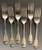 A matched set of six George III silver fiddle pattern dinner forks, William Ealey & William Fearn (