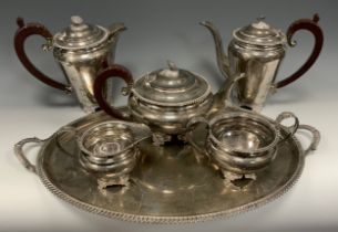 A mid 20th century Barker Brothers Silver Ltd five piece silver tea service on oval tray including