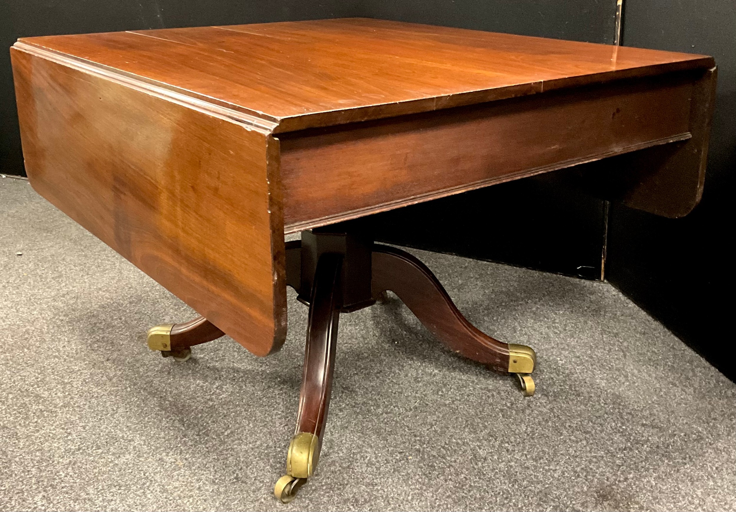 A Regency mahogany drop-leaf breakfast table, 74cm high, 106cm wide, 93cm (150cm with leaves