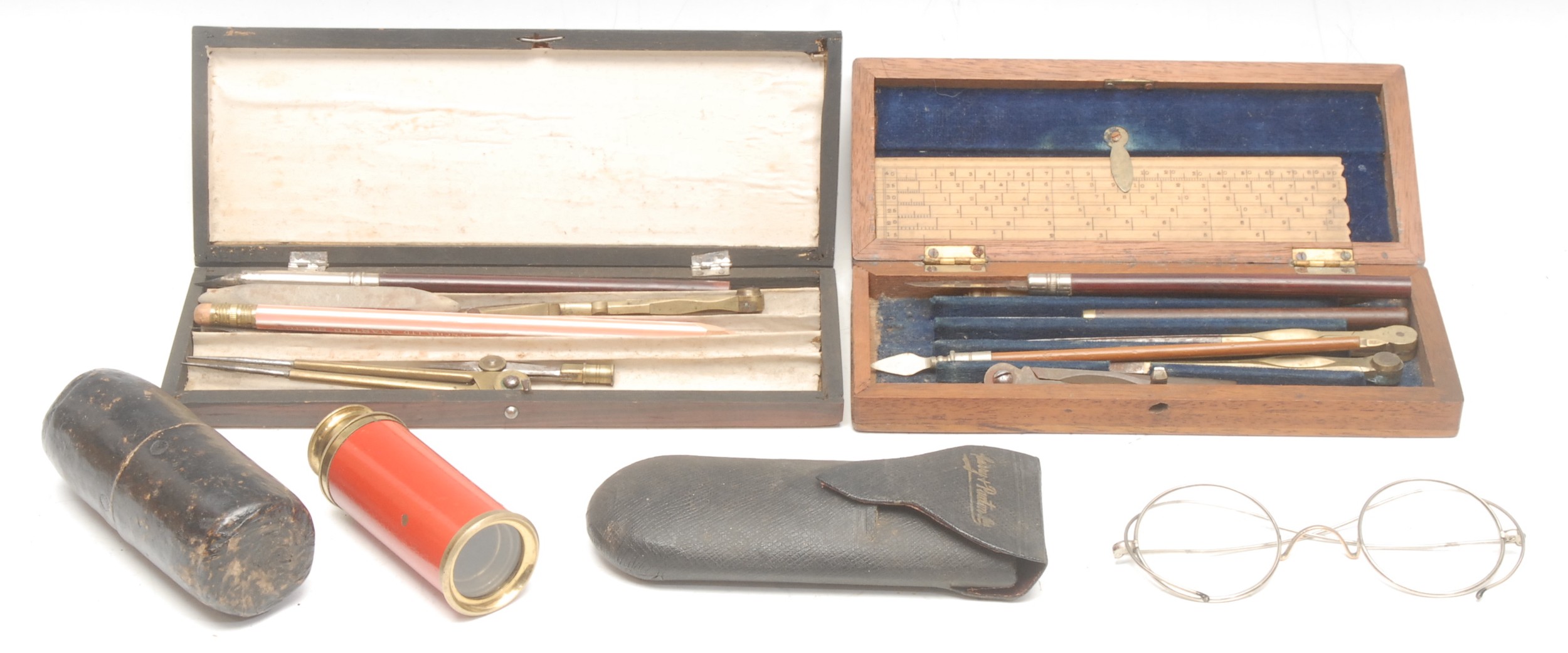 Geometry - an assortment of compasses, scalpels, and other stationary equipment, cased in an