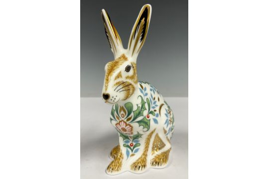 A Royal Crown Derby paperweight, Winter Hare, 13cm high, printed marks in grey, gold stopper - Image 2 of 3