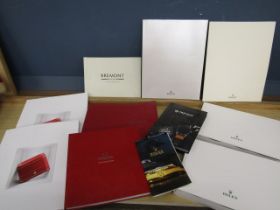 Watch catalogues inc Cartier, Rolex and Bremont