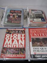 2 folders football programmes mainly Manchester United 1980s, some late 70s and a few earlier plus a