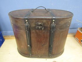 A large wood and leather wine carrier for 6 bottles