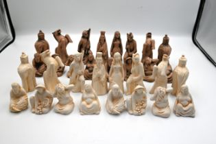Clay chess set, possibly persian? themed, height of king approx 9cm