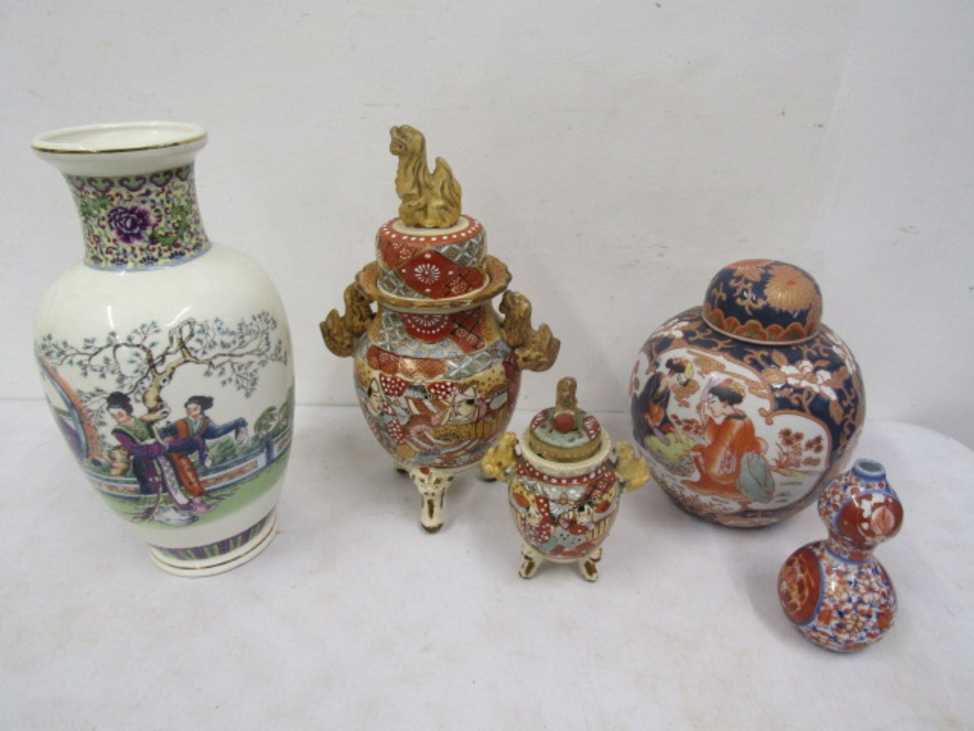 Oriental footed ginger jars and vases