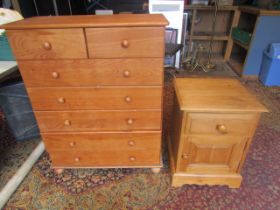 A solid pine bedside and 'pine' chest of drawers