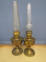 2 brass oil lamps with funnels