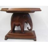 A hardwood elephant table 57cmH table top 65x59cm