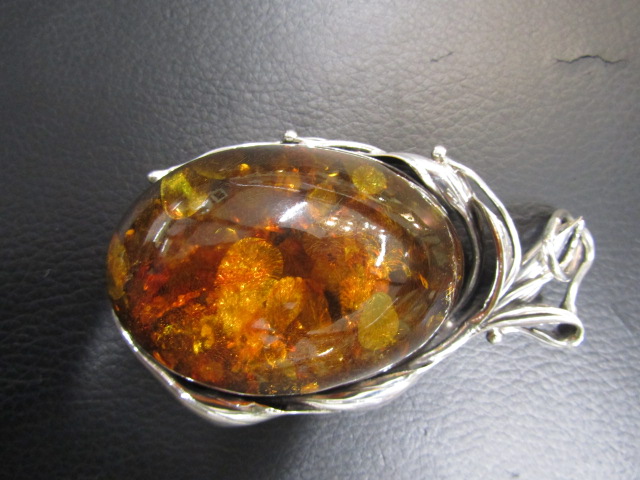 A large re-constituted Amber and Polish silver pendant 10cm long stamped 925 - Image 2 of 4