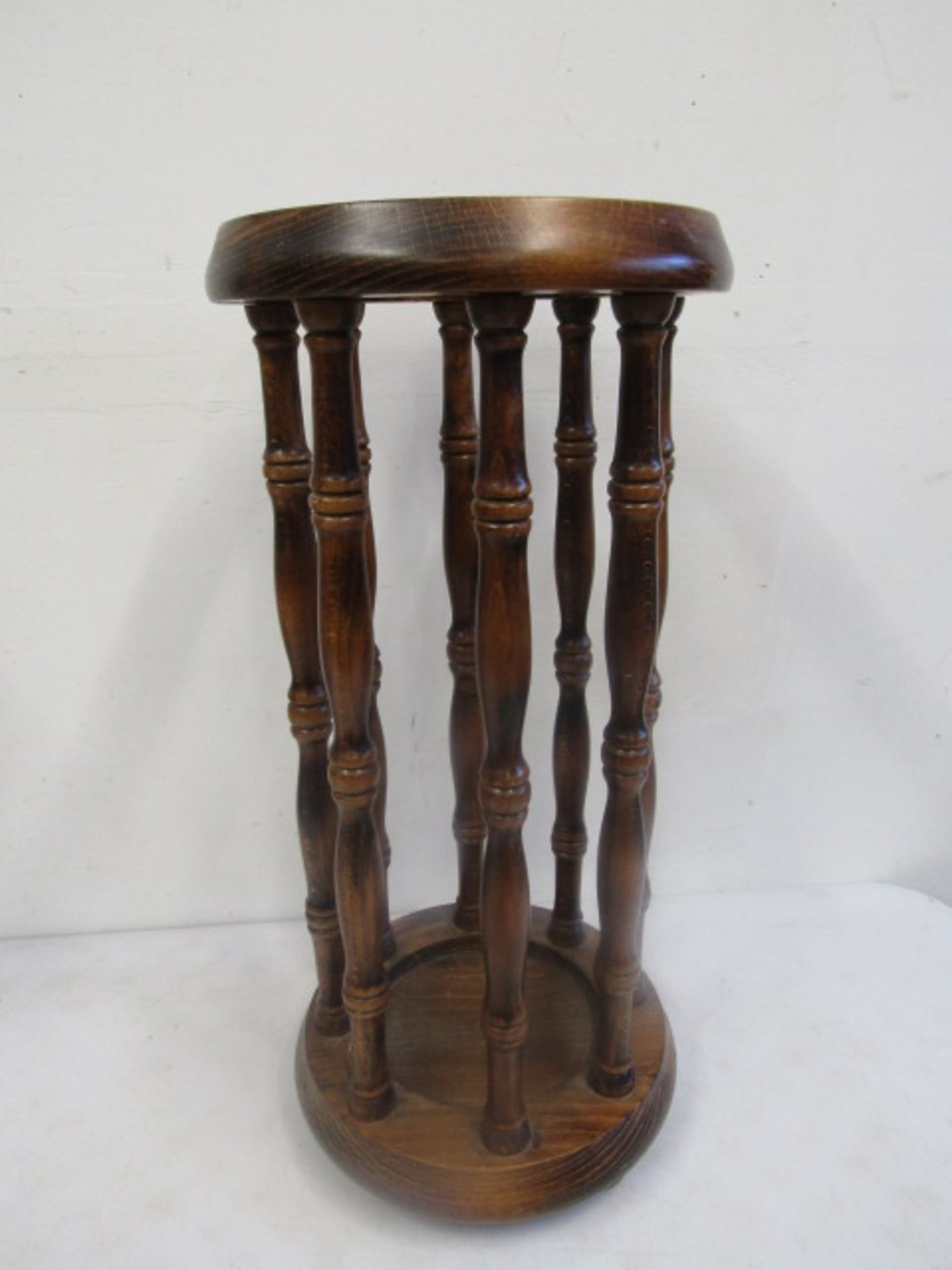 A wooden stick stand 54cmH