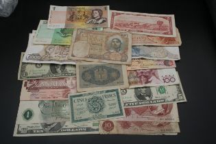 20 bank notes (foreign) plus 2x queen £1 and 2x brown 10/-
